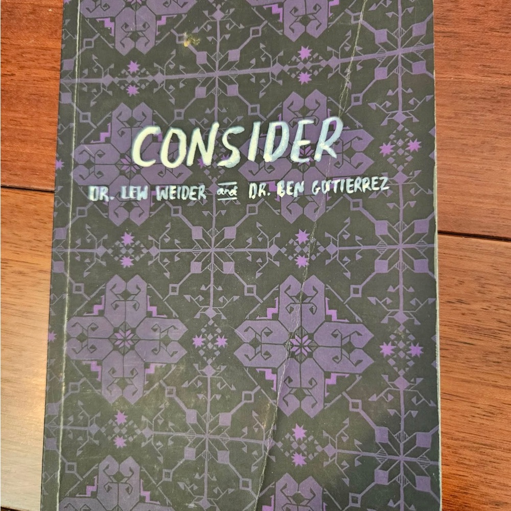 Consider Book with Purple and Black Cover